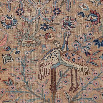 An oriental carpet, circa 350 x 295 cm.