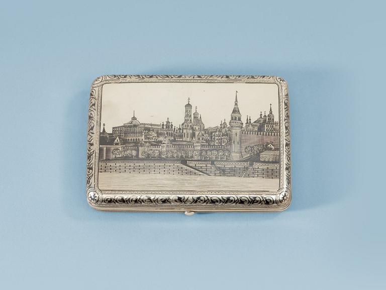 A Russian 19th century parcel-gilt and niello cigarette-case, makers mark of Ivan Chlebnikov, Moscow 1884.