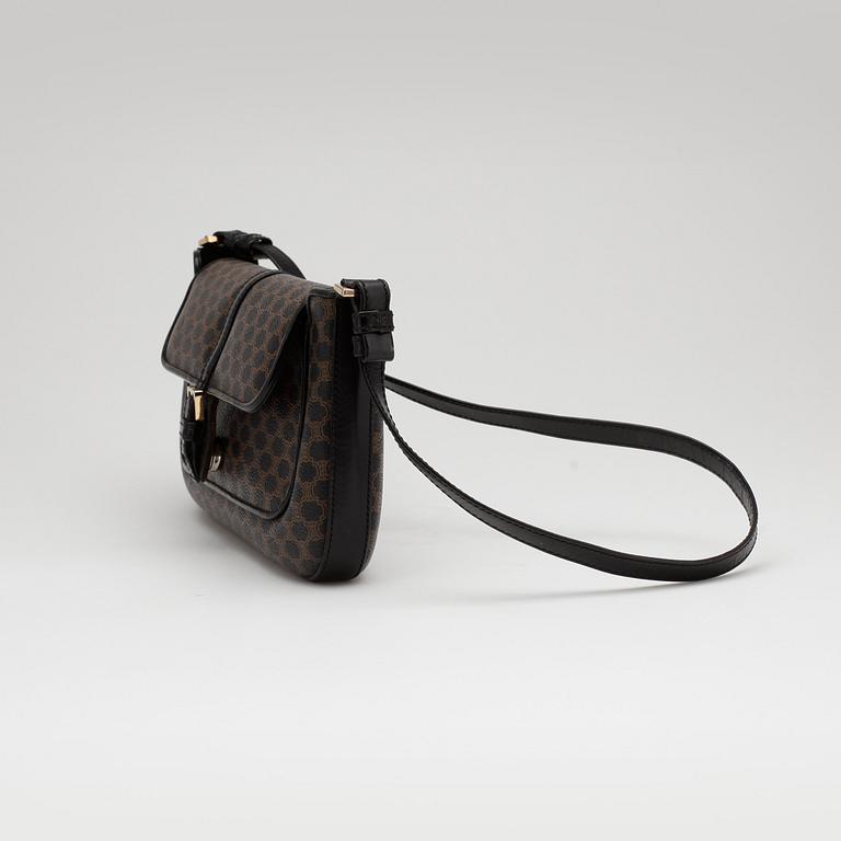 CÉLINE, a brown and black monogram canvas shoulder bag.