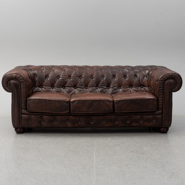 A 20th century leather upholstered Chesterfield sofa by Rubelli.