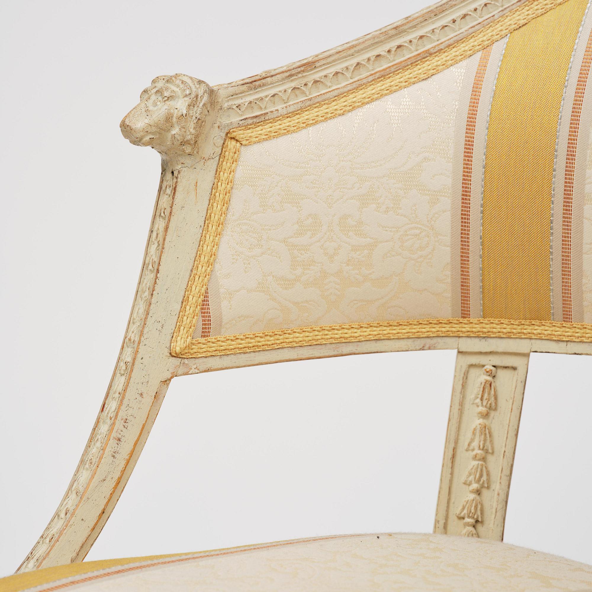 A matched pair of late Gustavian armchairs.