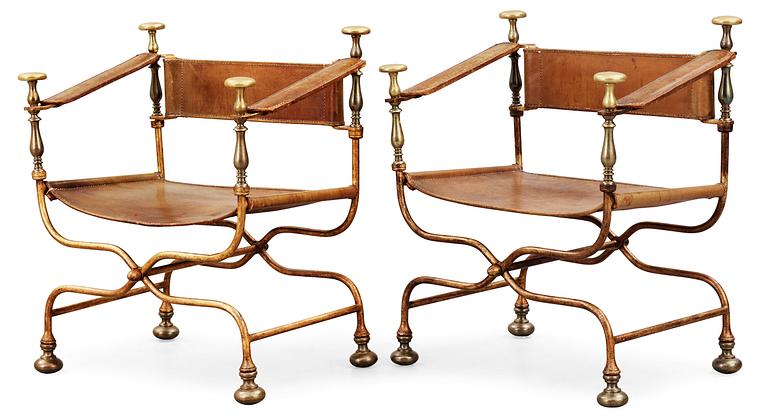 A pair of Italian neo-classical iron and brass
easy chairs, Italy mid 20th C.