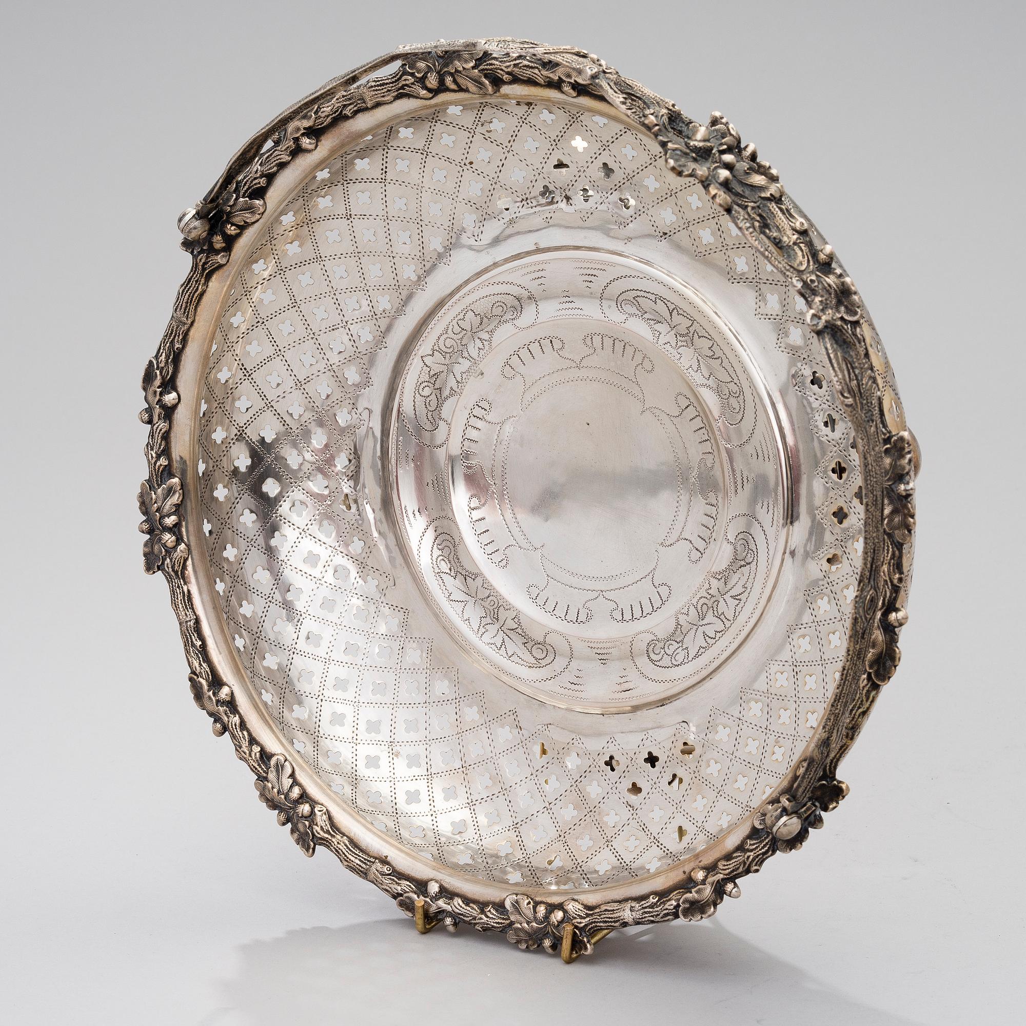 A SILVER SWING HANDLE BASKET, Germany late 19th century, controll marks Soviet Union, 20th century, weight 694 g.
