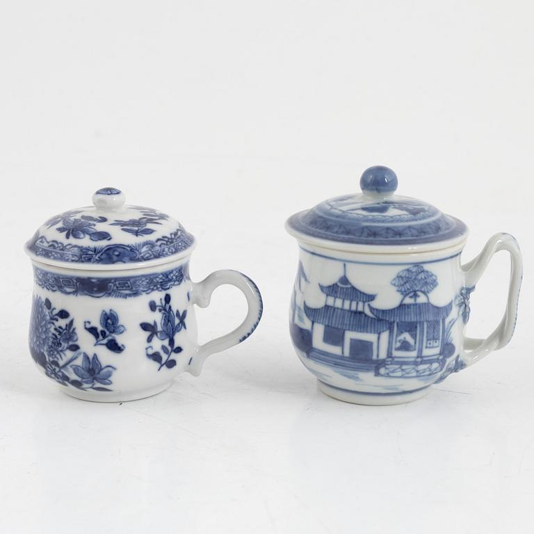 A pair of Chinese blue and white porcelain chocolate cups and four custard cups, Qing dynasty, late 18th century.