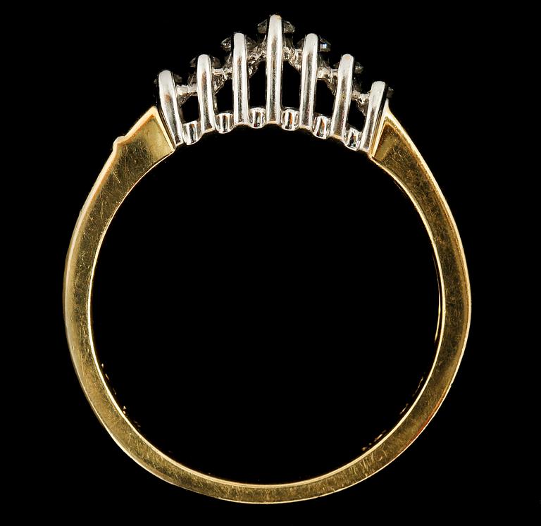 RING, 14k guld med 7 navetteslipade diamanter. Tot vikt 0.25 ct. Vikt 3 g.