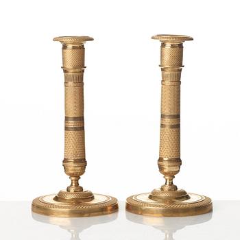 A pair of French Empire candlesticks, early 19th century.