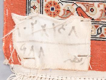 A SILK CARPET, Ghom, signed, 150x102 cm.
