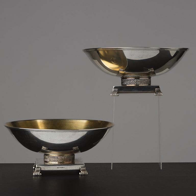 A pair of Swedish 20th century parcel-gilt silver bowls, maker's mark of CG Hallberg, Stockholm 1934 and 1935.