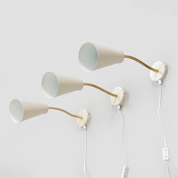 A set of three mid-20th century wall lights, model AH6, for Itsu Finland.