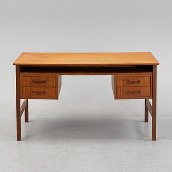 A 1960's teak writing desk.