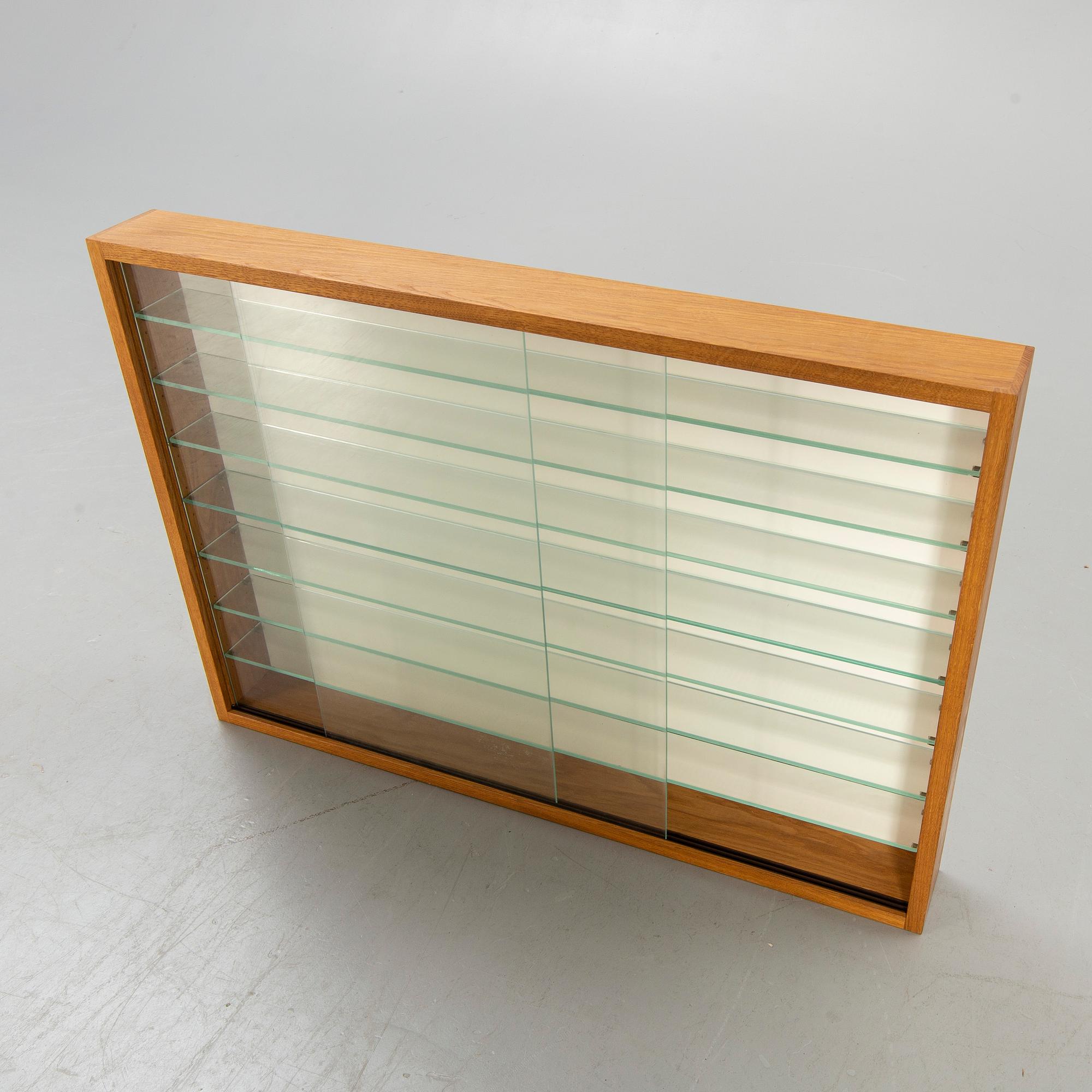 Glass display cabinet, second half of the 20th century.