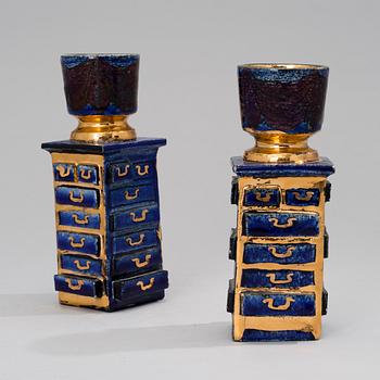 BIRGER KAIPIAINEN, A PAIR OF CANDLESTICKS. One signed Kaipiainen.