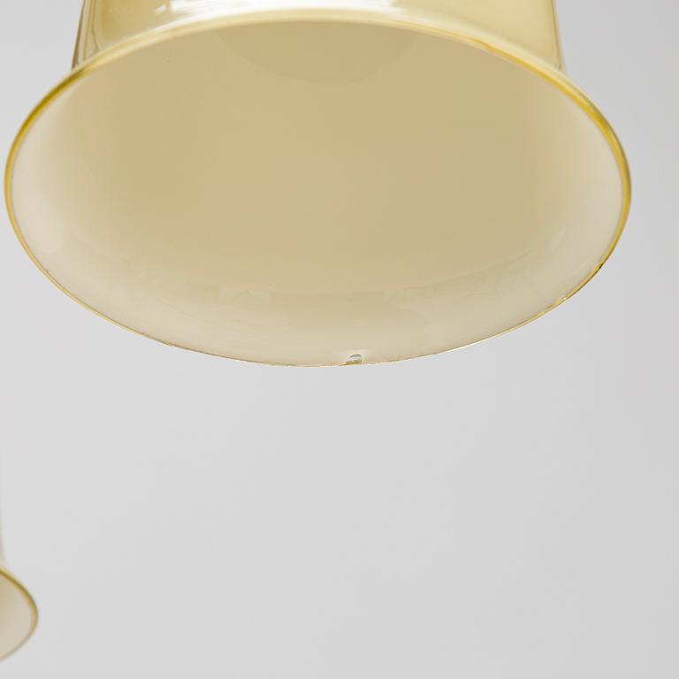 A 1940s-50s nine-arm pendant ceiling light.