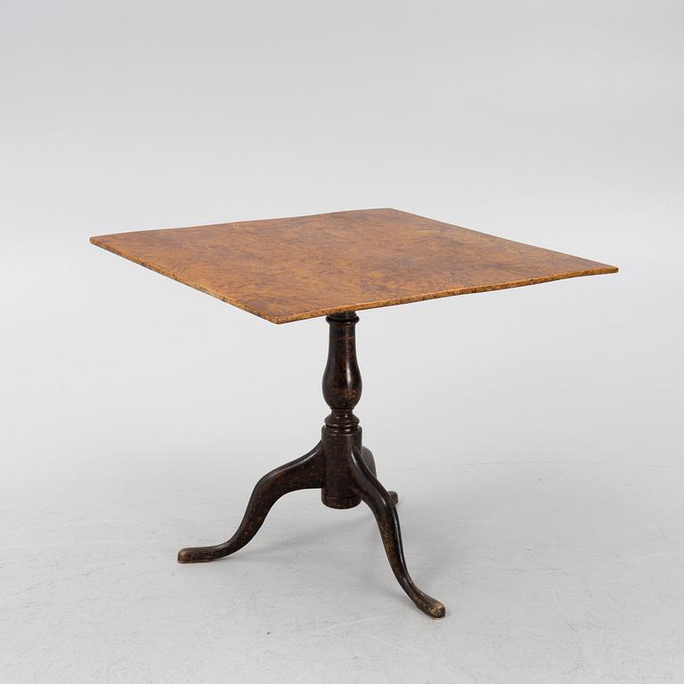 A burr alder tilt-top table by J. Sjölin (master 1767-85).