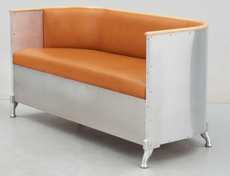 A Mats Theselius aluminium and leather sofa, Källemo Sweden.