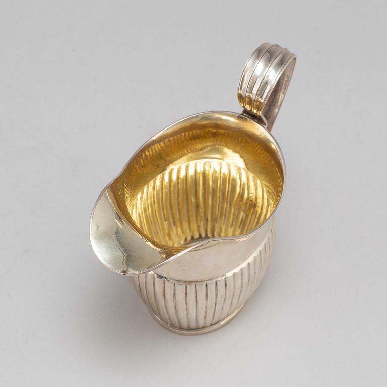 A silver creamer by JL Klint, Norrtälje 1828.