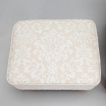 A mid-20th-century armchair and ottoman.