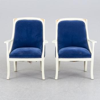A pair of art nouveau armchairs.