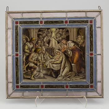 A pair of stained glass windows, circa 1900.