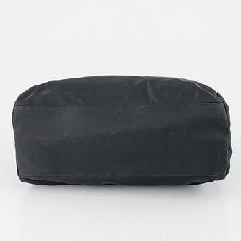 Prada, a black nylon handbag.