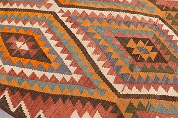 A kurdish kilim carpet, ca 310 x 173 cm.