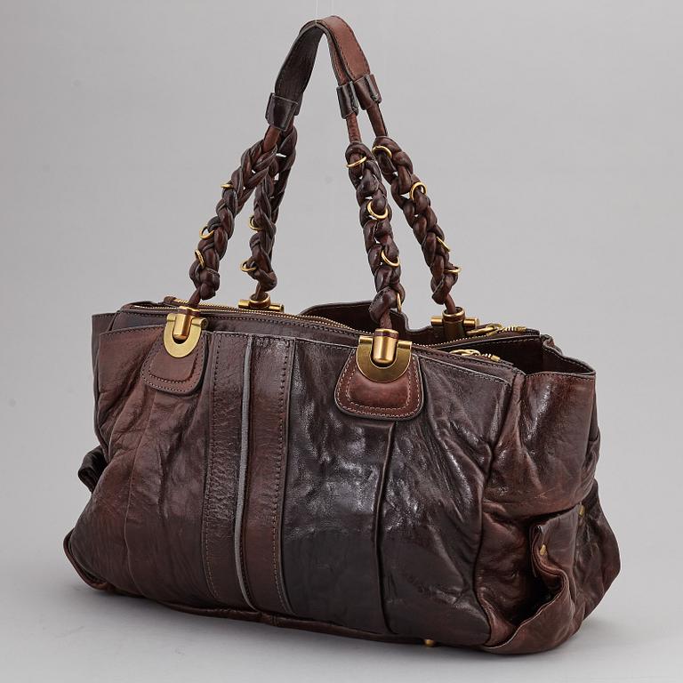 CHLOÉ, a brown leather bag.