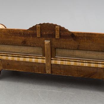 A mahogany sofa dated 1840.