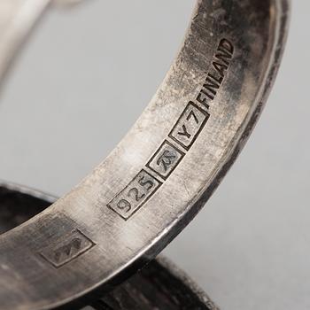 A silver pendant, bracelet and pair of ear rings by Karl Laine, Finland, 1975.