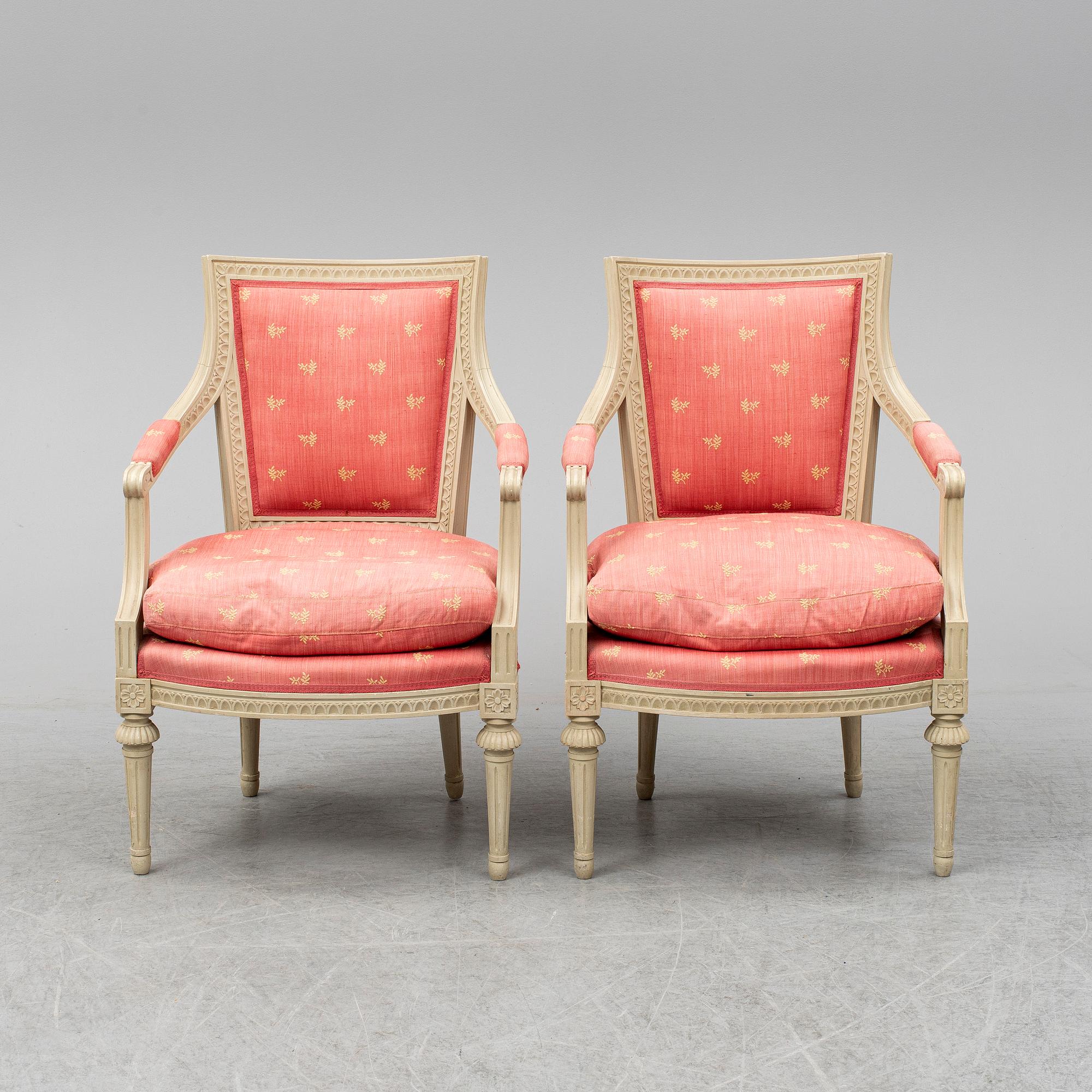A pair of gustavian style armchairs, second half of the 20th century.