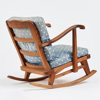 "Sportstugemöbel", a stained pine rocking chair, Nordiska Kompaniet Sweden 1930-40's.