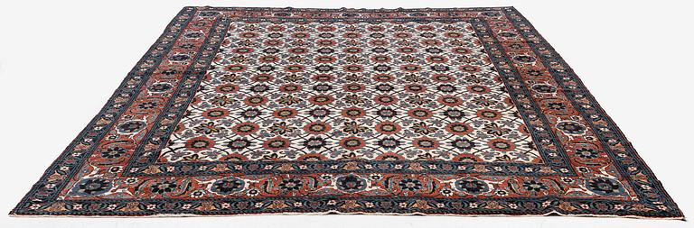 An antique Veramin carpet, West Persia, 380 x 271 cm.
