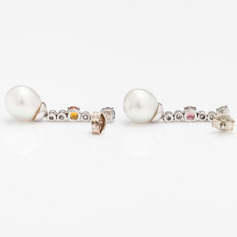 A pair of 18K white gold earrings with diamonds, tourmaline, peridote, citrine, cordierite and tahiti pearls.