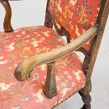 An oak baroque armchair from around the year 1700.