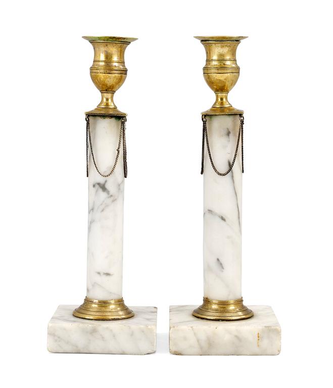 A pair of Gustavian candlesticks.