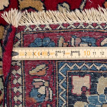 An antique Isfahan rug, ca 235 x 145 cm.