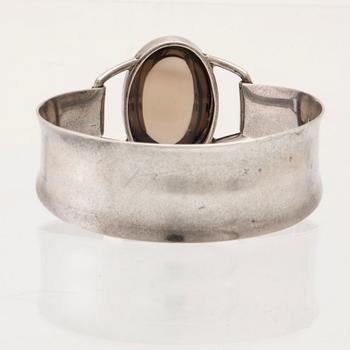 Silver bracelet with cabochon-cut smoky quartz, Gussi Malmö 1964.