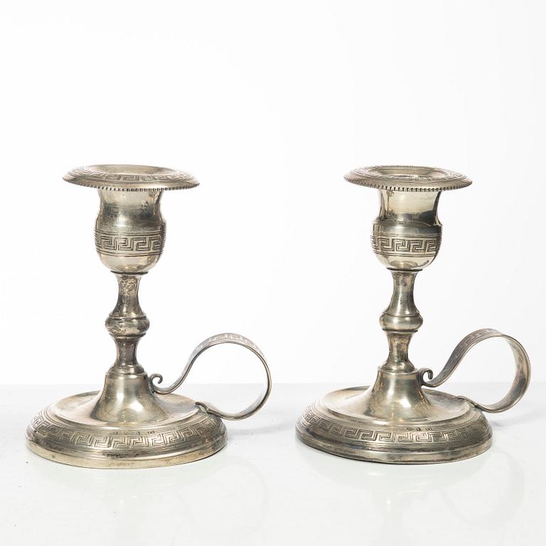 Four pairs och Swedish silver candlesticks, 19th-20th century.