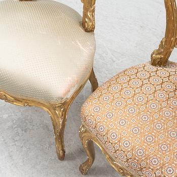 A pair of gesso and giltwood rococo-revival chairs, later part of the 19th Century.