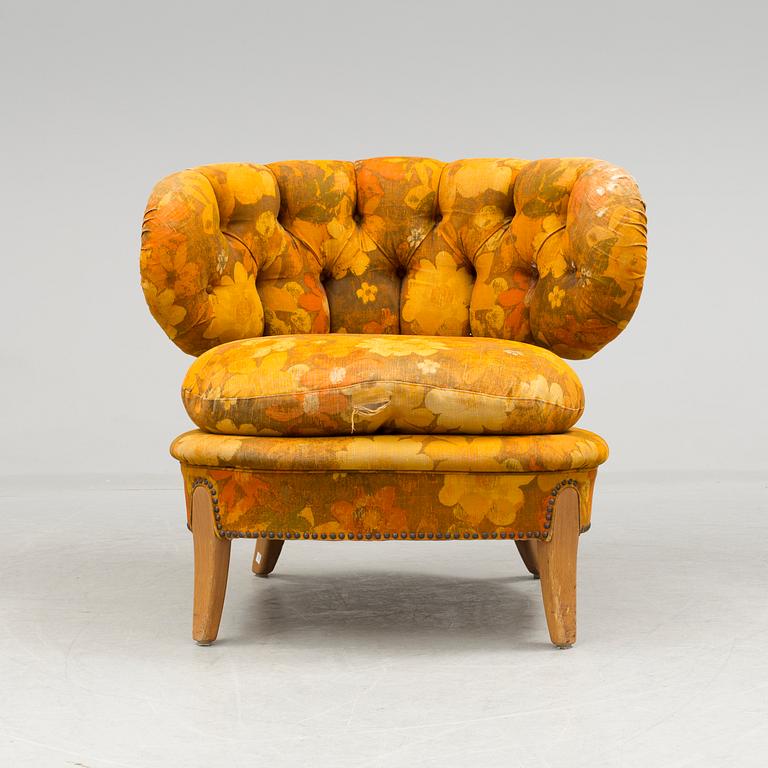 A mid 20th century "Schulz" easy chair by Otto Schulz.