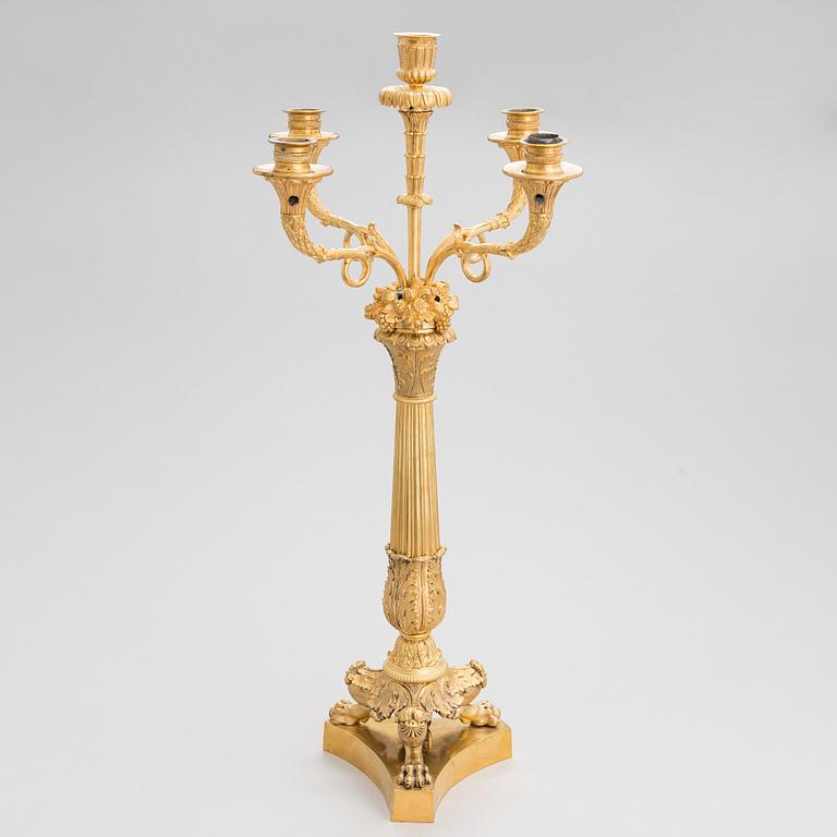A latter half of the 19th-century candelabrum/ table light, altered in the 20th century.