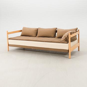 Sofa, likely IKEA, late 20th century.