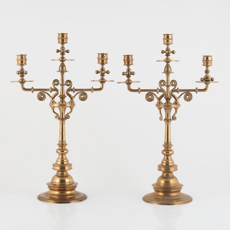 A pair of brass candelabra, Gusums Bruk, circa 1900.