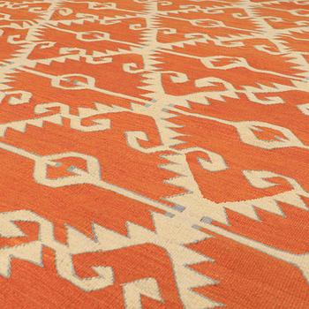 A flatweave rug, 290 x 223 cm.