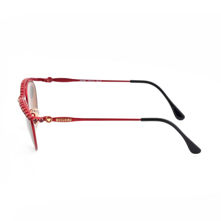 MOSCHINO, ett par solglasögon.
