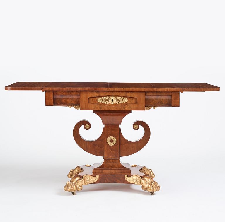 A Swedish Empire mahogany center table attributed to Johan Öman, (Stockhom 1815-1833).