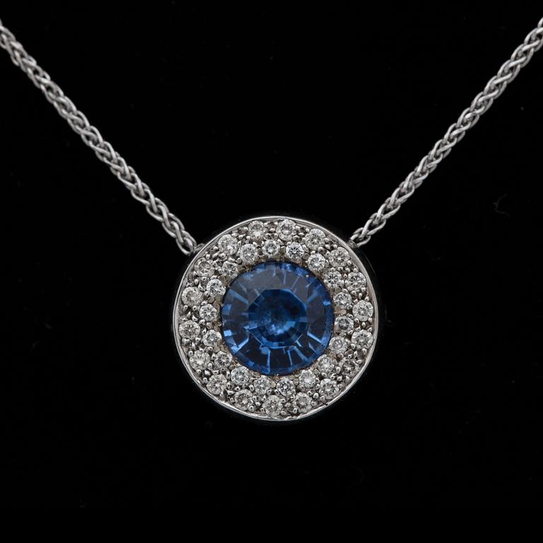 A sapphire pendant, app. 2 cts with brilliant cut diamonds tot. app. 0.60 ct.