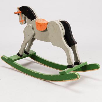 A rocking horse from the first half of the 20th Century.