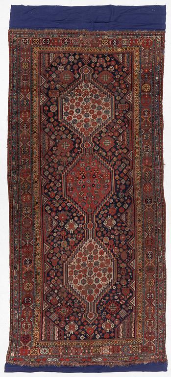 An antique Khamseh runner, southwestern Iran, c. 330 x 157 cm.