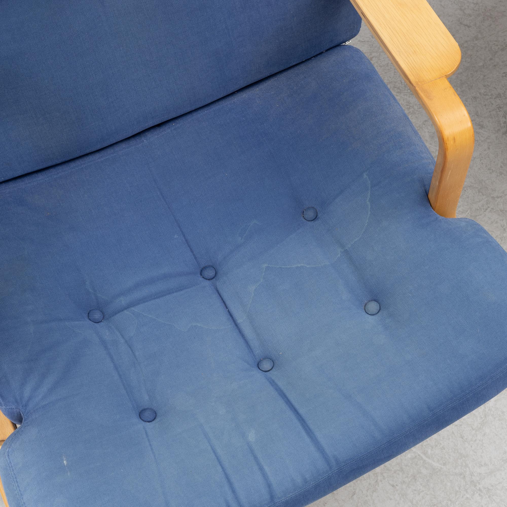 Bruno Mathsson, a pair of armchairs with ottomans, 'Ingrid', Dux, second half of the 20th century.