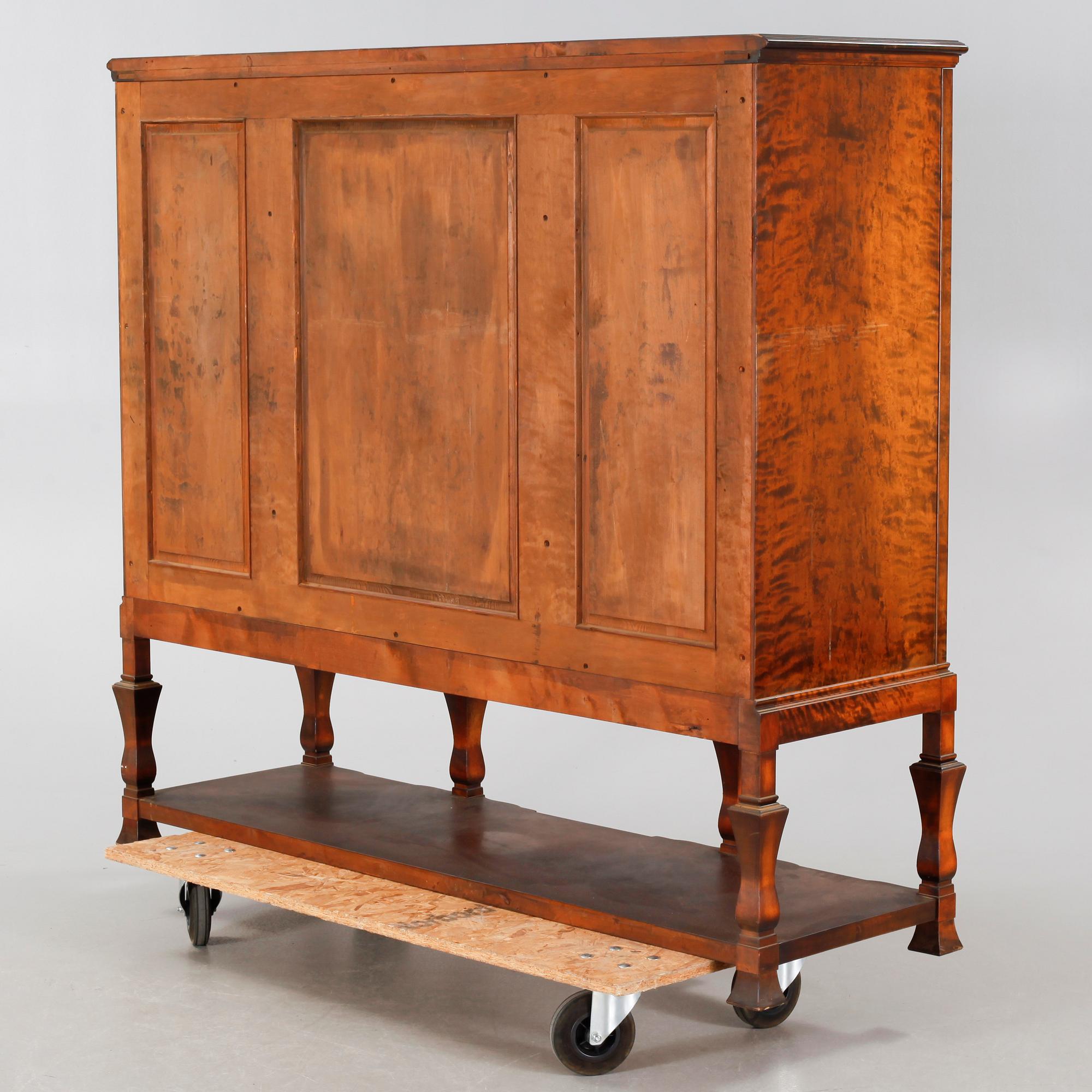 A 1920/30s swedish grace cupboard, model "Sture", made by AB Seffle Möbelfabrik.